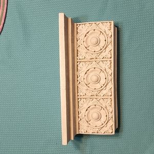 Hermitage off white poly resin floral shelf